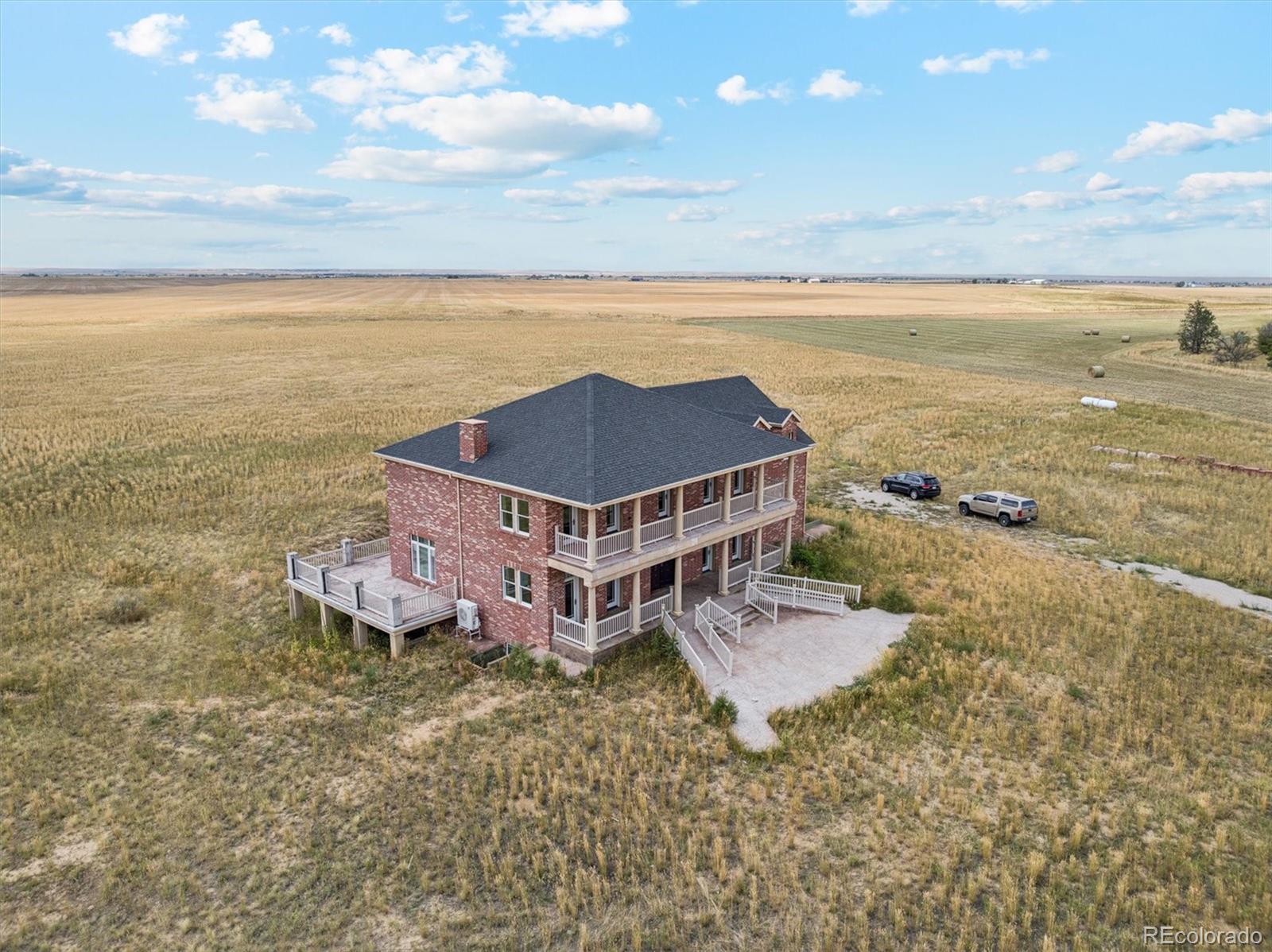 2105 Timberlake Road Byers, CO 80103 - Photo 47 of 48 an aerial view of a house with a ocean view