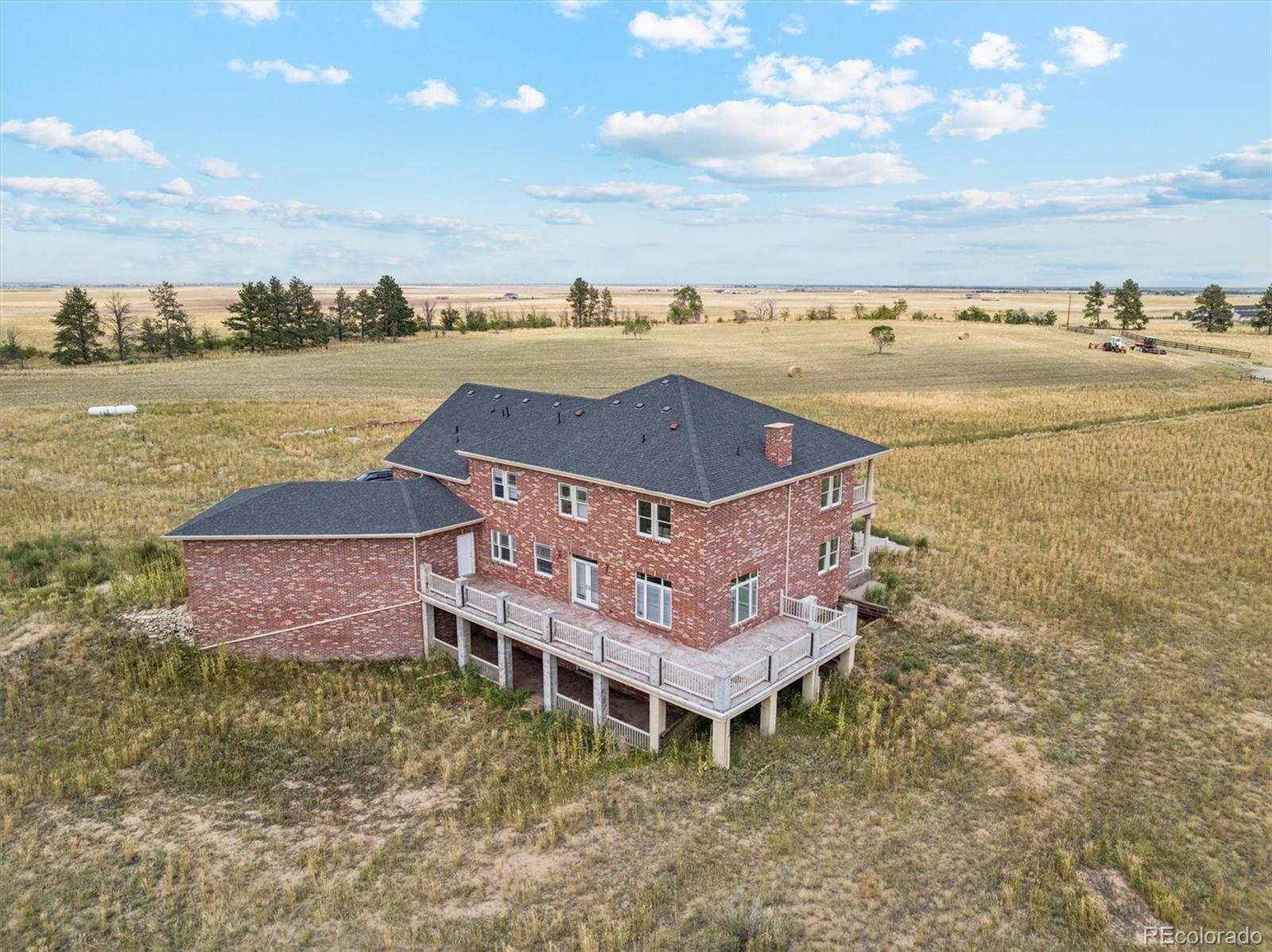 2105 Timberlake Road Byers, CO 80103 - Photo 48 of 48 an aerial view of a house with a garden
