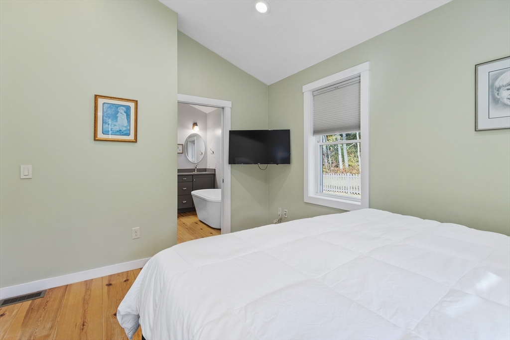 216 Padre Road New Braintree, MA 01531 - Photo 12 of 29 a bedroom with a bed and a window