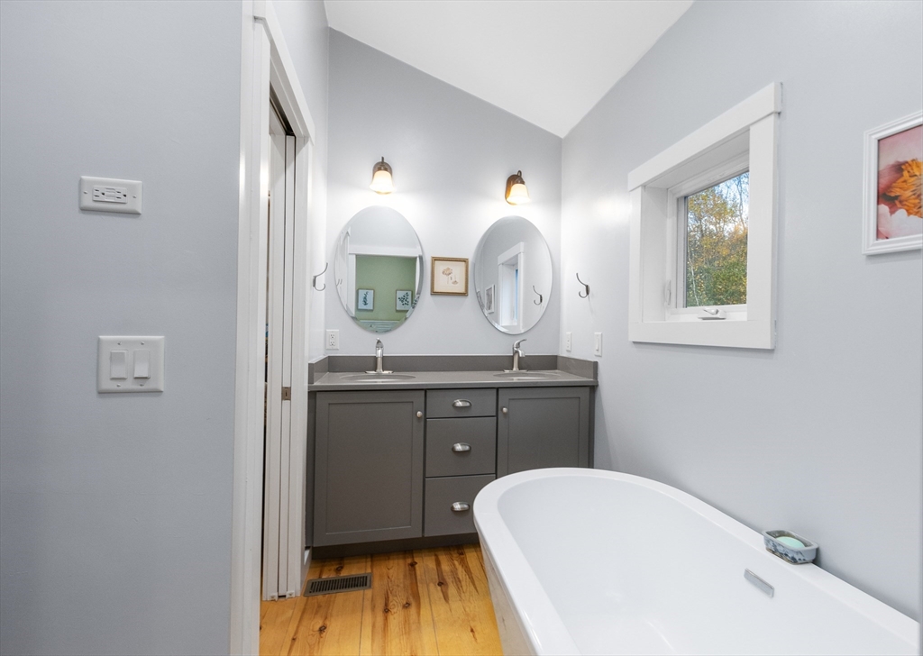 216 Padre Road New Braintree, MA 01531 - Photo 14 of 29 a bathroom with a sink and a mirror