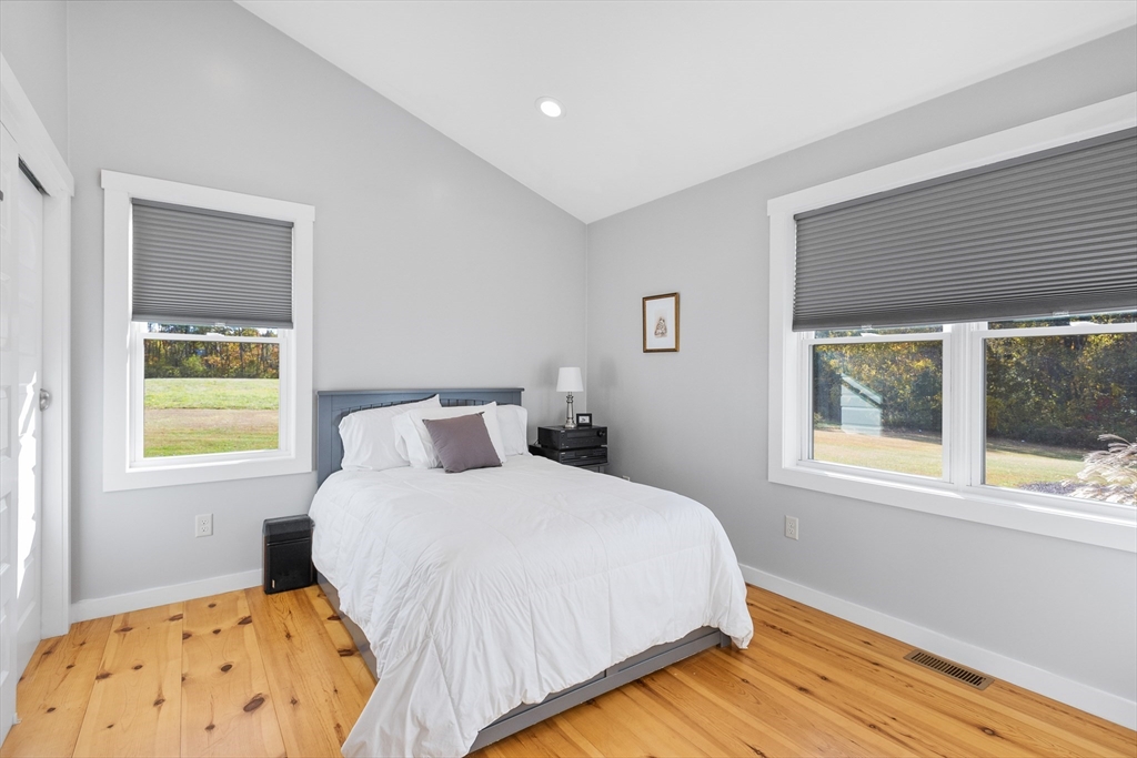 216 Padre Road New Braintree, MA 01531 - Photo 15 of 29 a bedroom with a bed and a window