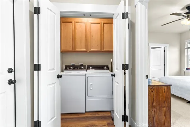 a view of a kitchen with stove and refrigerator