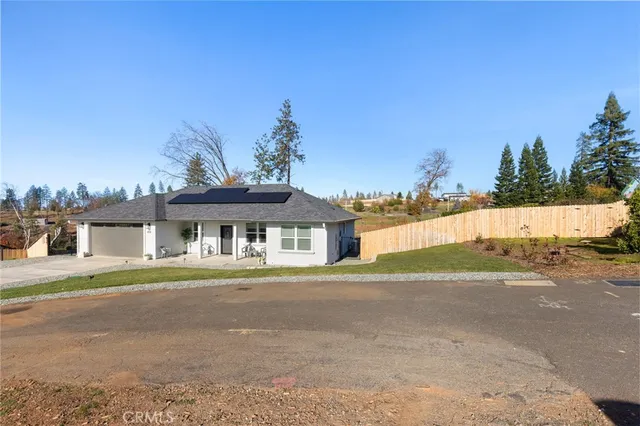 front view of a house with a street