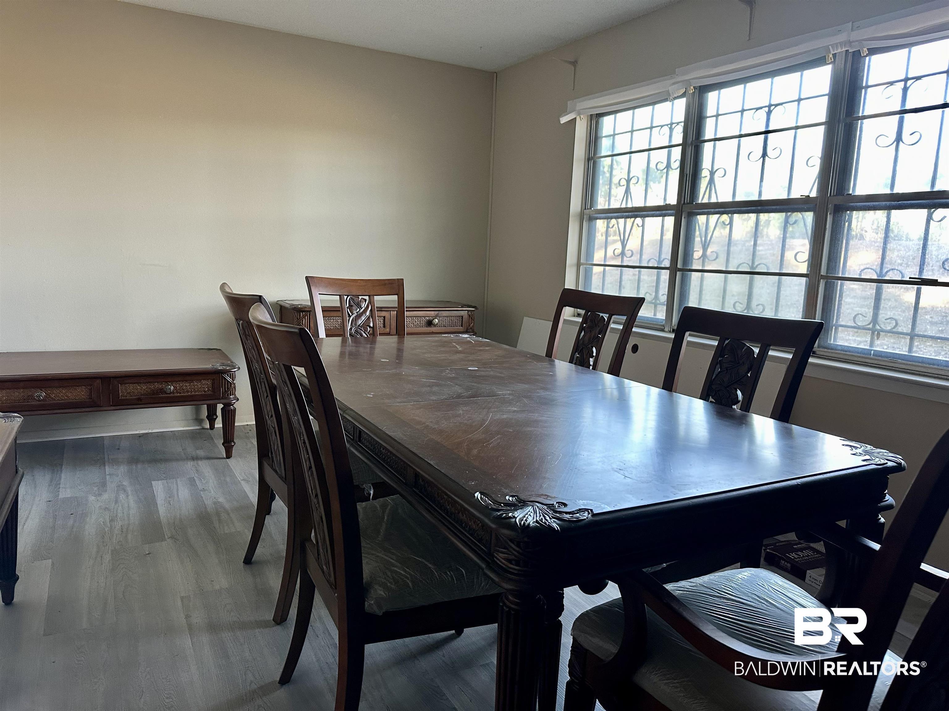 3451 Kirkland Road Brewton, AL 36426 - Photo 10 of 17 Dining room with hardwood / wood-style flooring