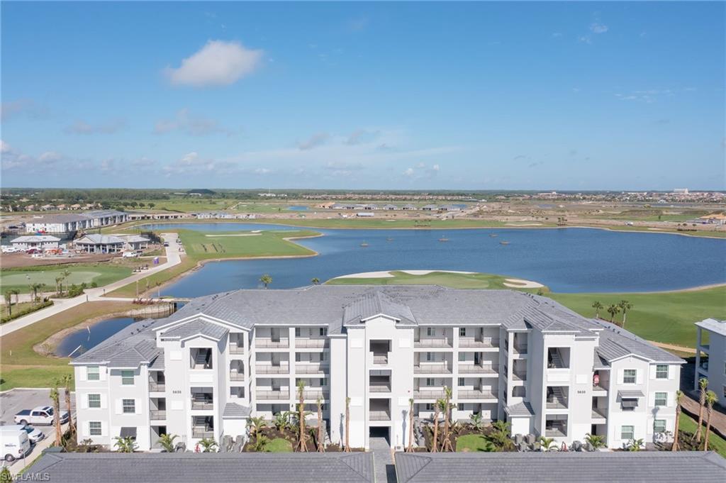 a view of a building with an ocean