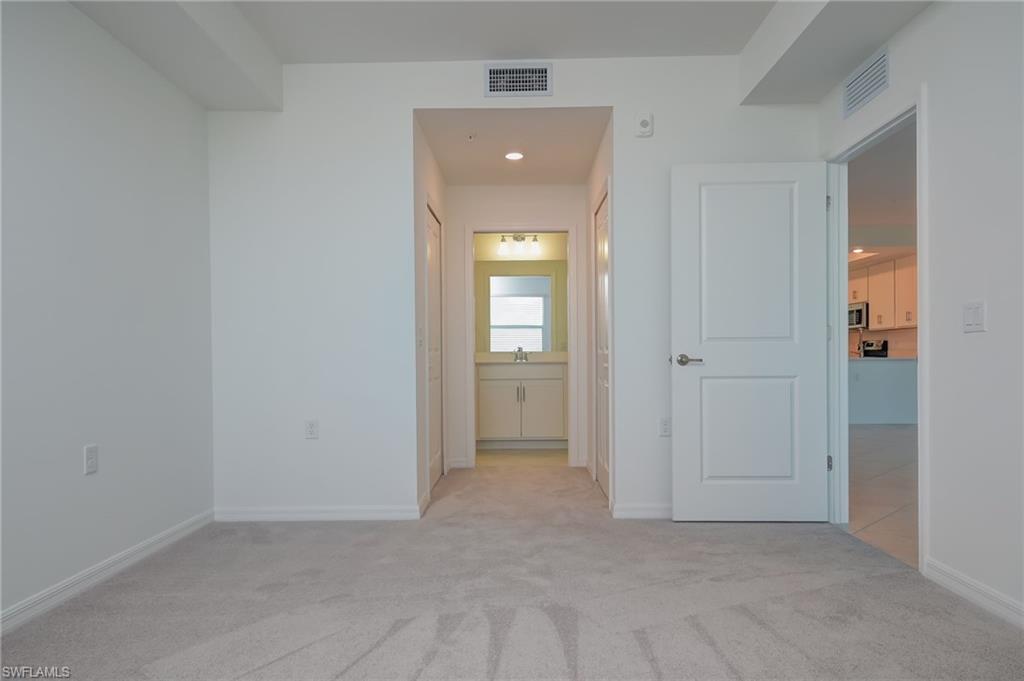 5835 Double Eagle Circle, Unit 4724 Immokalee, FL 34142 - Photo 12 of 25 an empty room that has a bathroom in it