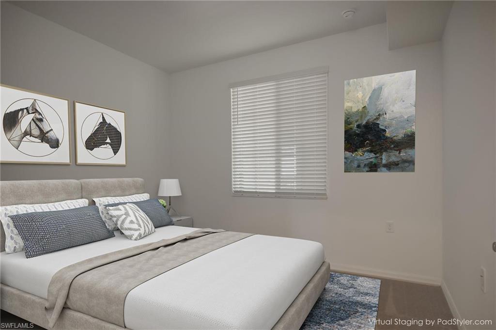 5835 Double Eagle Circle, Unit 4724 Immokalee, FL 34142 - Photo 14 of 25 a bedroom with a bed and a window