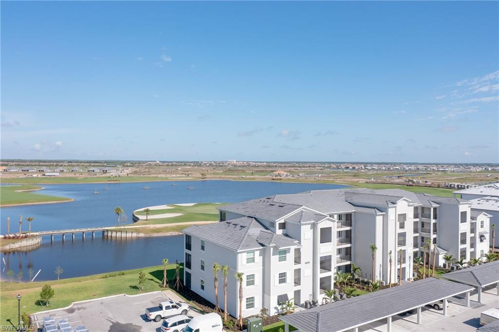 5835 Double Eagle Circle, Unit 4724 Immokalee, FL 34142 - Photo 21 of 25 a view of a city with an ocean view