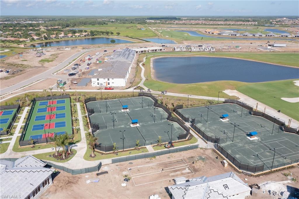 5835 Double Eagle Circle, Unit 4724 Immokalee, FL 34142 - Photo 23 of 25 a view of a city with an ocean