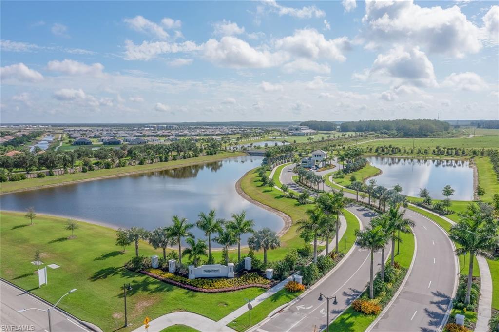 5835 Double Eagle Circle, Unit 4724 Immokalee, FL 34142 - Photo 25 of 25 a view of a lake with a outdoor space