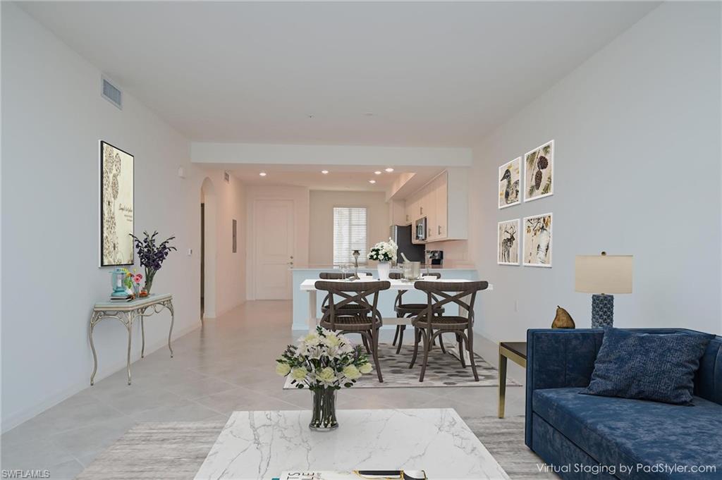 5835 Double Eagle Circle, Unit 4724 Immokalee, FL 34142 - Photo 4 of 25 a view of a dining room with furniture