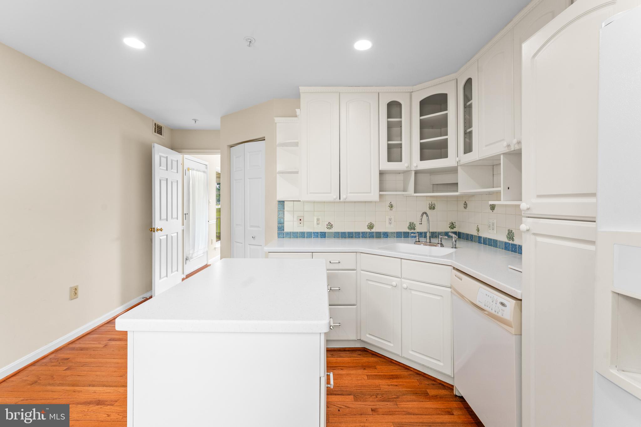 11709 Thrift Road Clinton, MD 20735 - Photo 26 of 71 a kitchen that has a sink and a stove in it