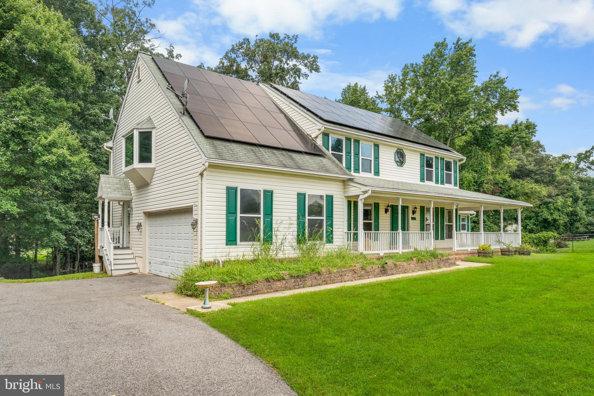 11709 Thrift Road Clinton, MD 20735 - Photo 3 of 71 front view of a house with a yard