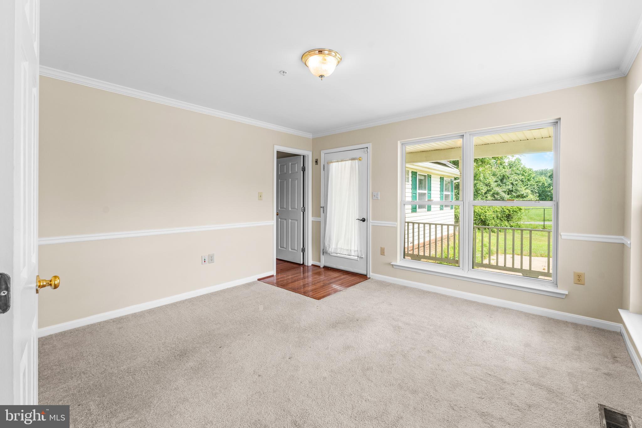 11709 Thrift Road Clinton, MD 20735 - Photo 36 of 71 a view of an empty room with a window