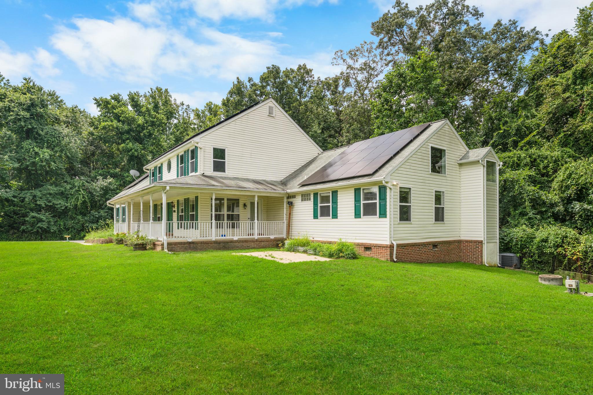 11709 Thrift Road Clinton, MD 20735 - Photo 4 of 71 a front view of a house with a yard