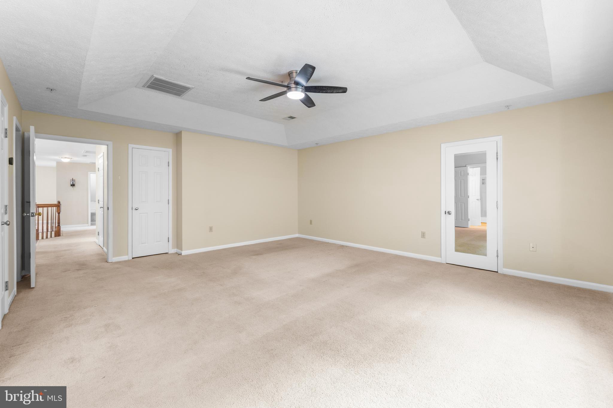 11709 Thrift Road Clinton, MD 20735 - Photo 43 of 71 an empty room with a ceiling fan and window