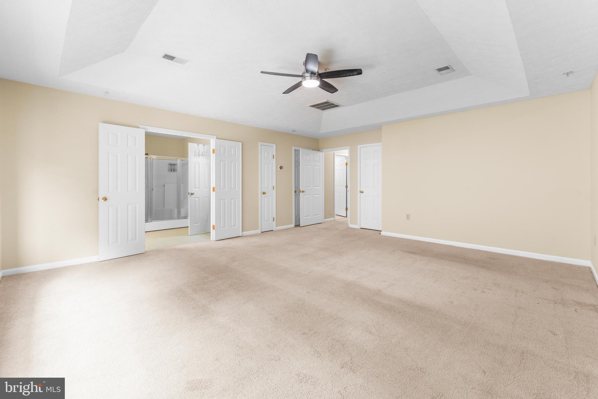 11709 Thrift Road Clinton, MD 20735 - Photo 44 of 71 a view of a big room with chandelier fan and windows