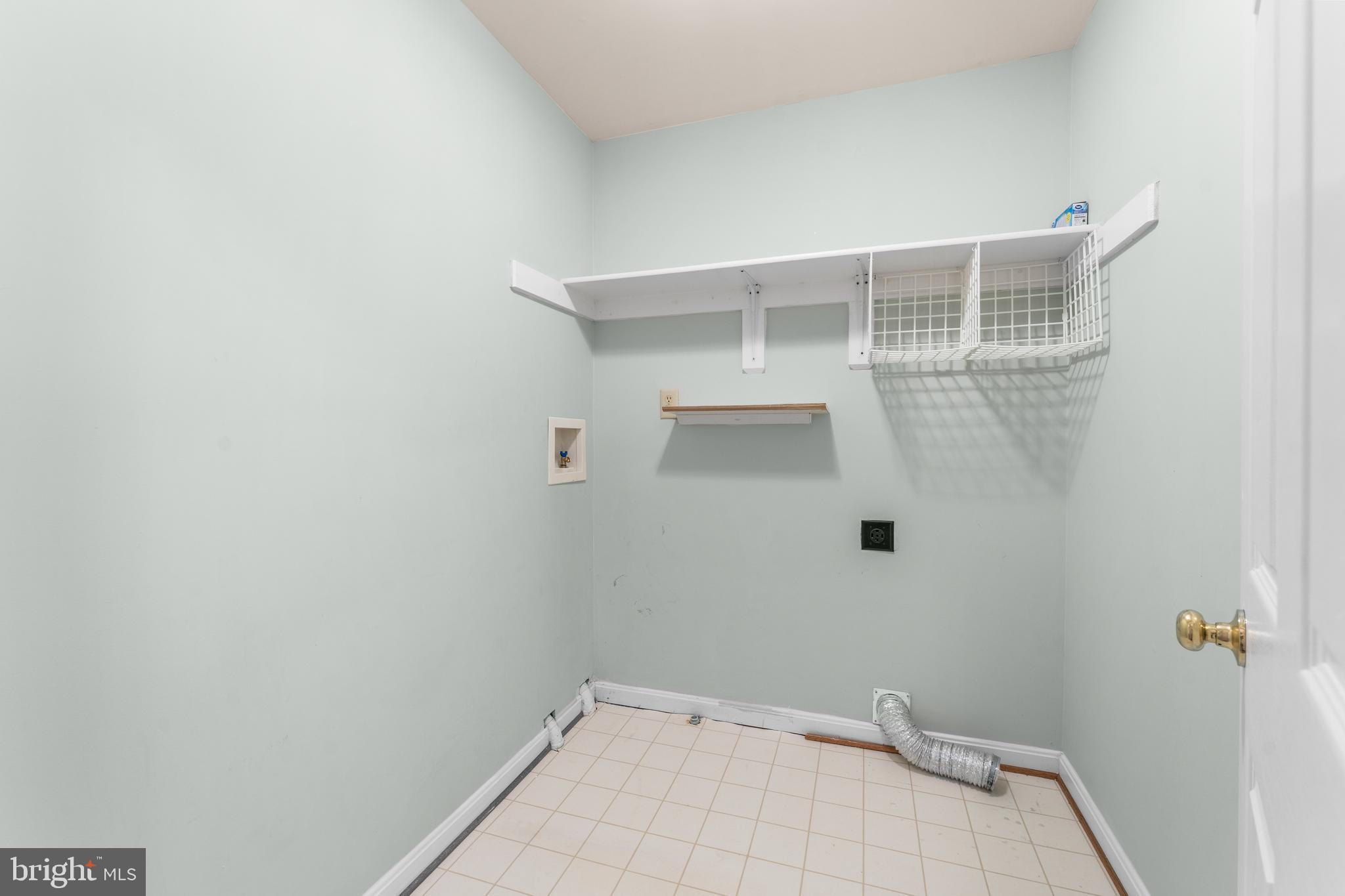 11709 Thrift Road Clinton, MD 20735 - Photo 48 of 71 a view of a room with shelf