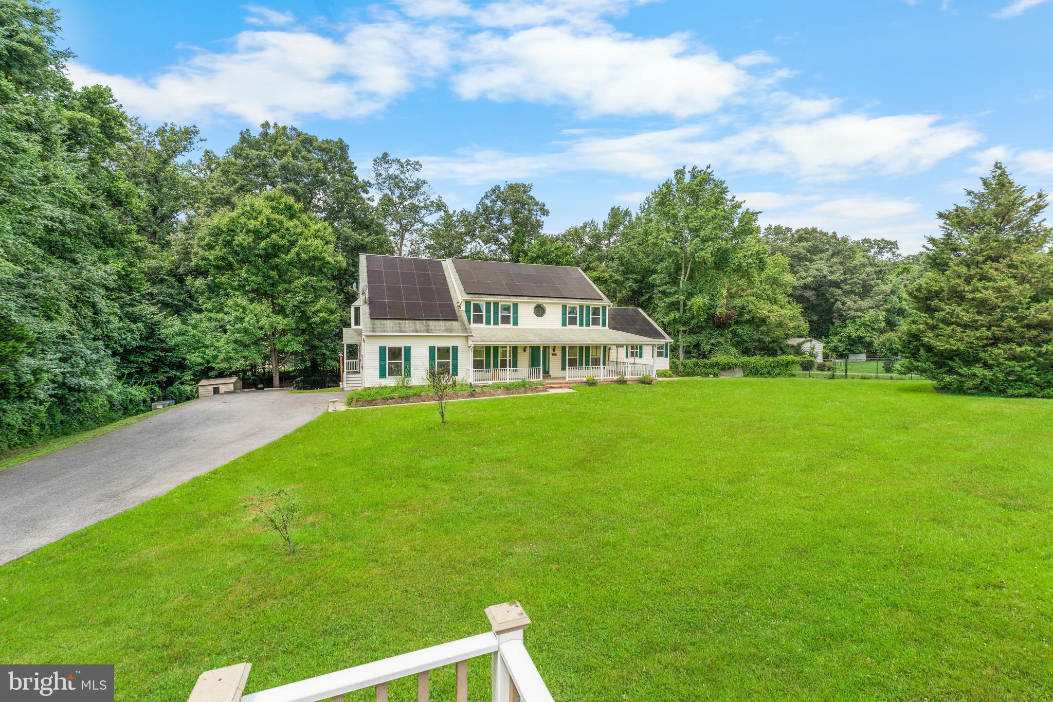 11709 Thrift Road Clinton, MD 20735 - Photo 5 of 71 a view of a house with a big yard