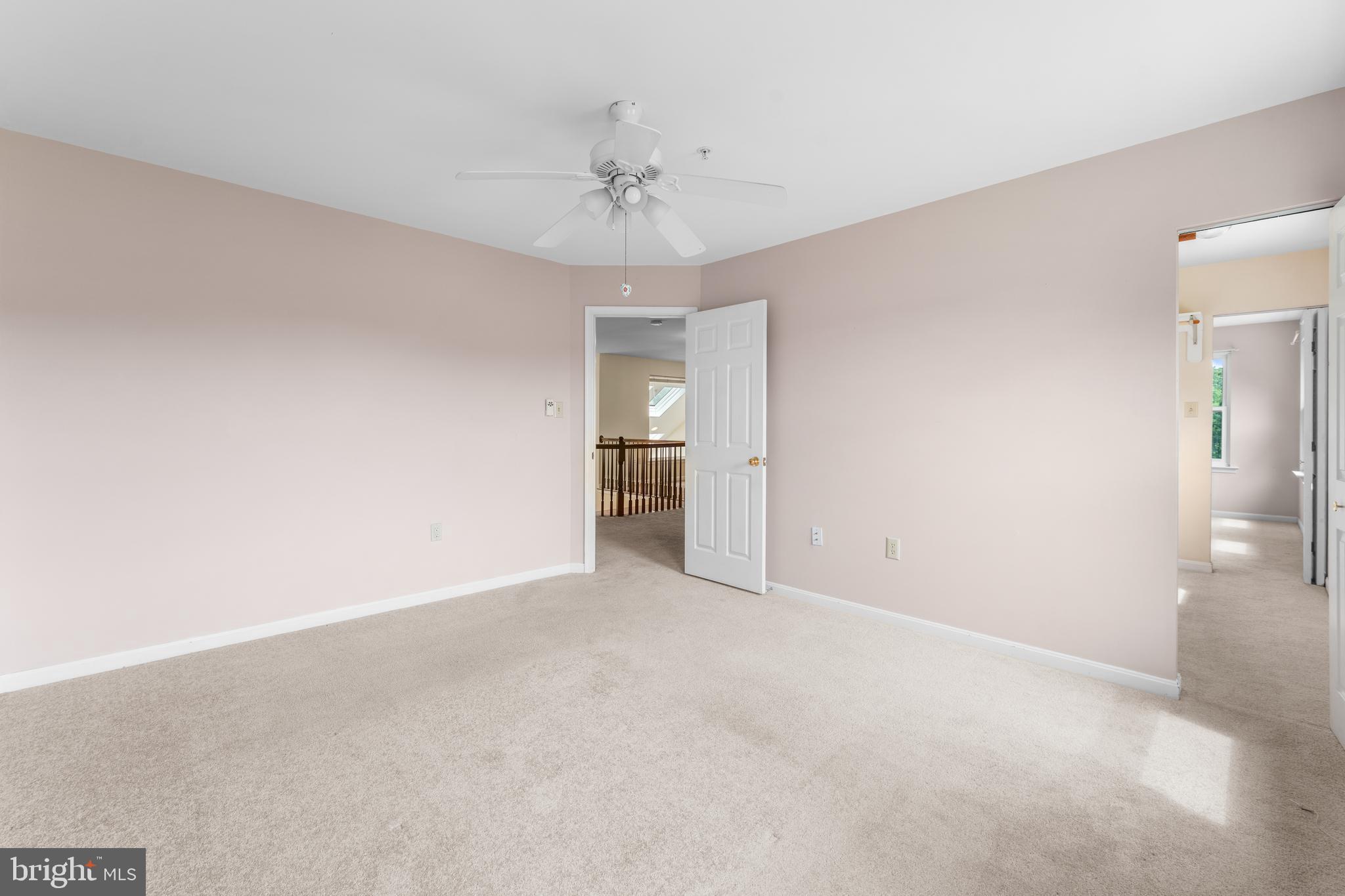 11709 Thrift Road Clinton, MD 20735 - Photo 51 of 71 a view of an empty room with a chandelier fan