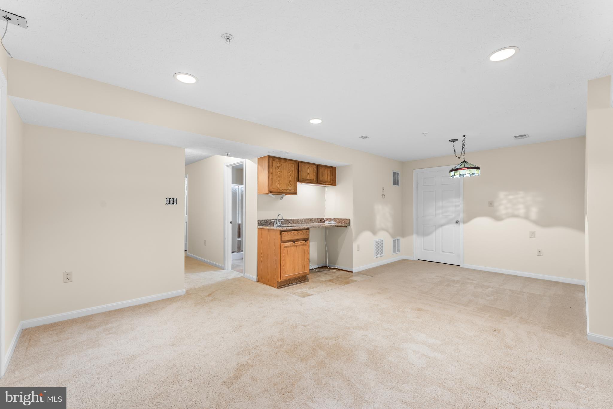 11709 Thrift Road Clinton, MD 20735 - Photo 59 of 71 a view of a kitchen with a sink and a refrigerator