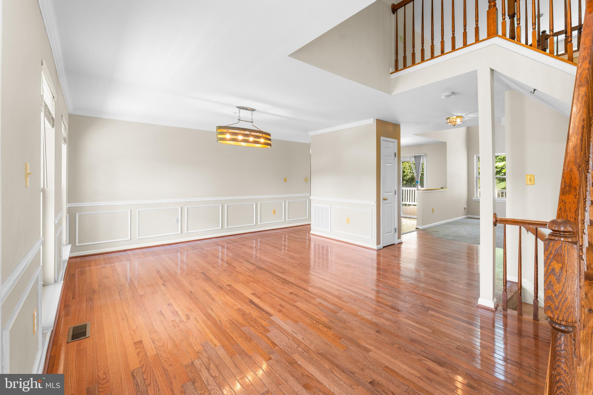 11709 Thrift Road Clinton, MD 20735 - Photo 8 of 71 a view of an empty room with wooden floor