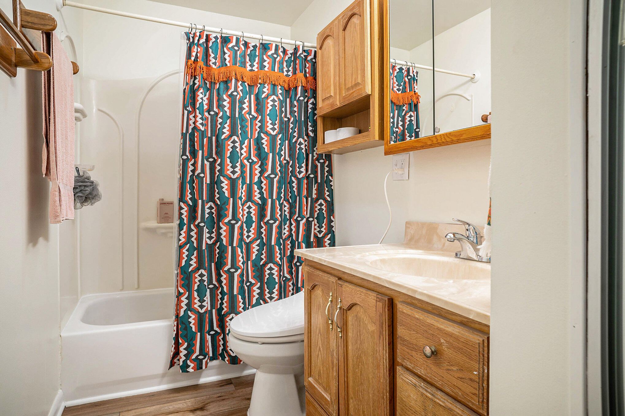 938 Walnut Lane Crown Point, IN 46307 - Photo 12 of 17 a bathroom with a sink a toilet and a bathtub