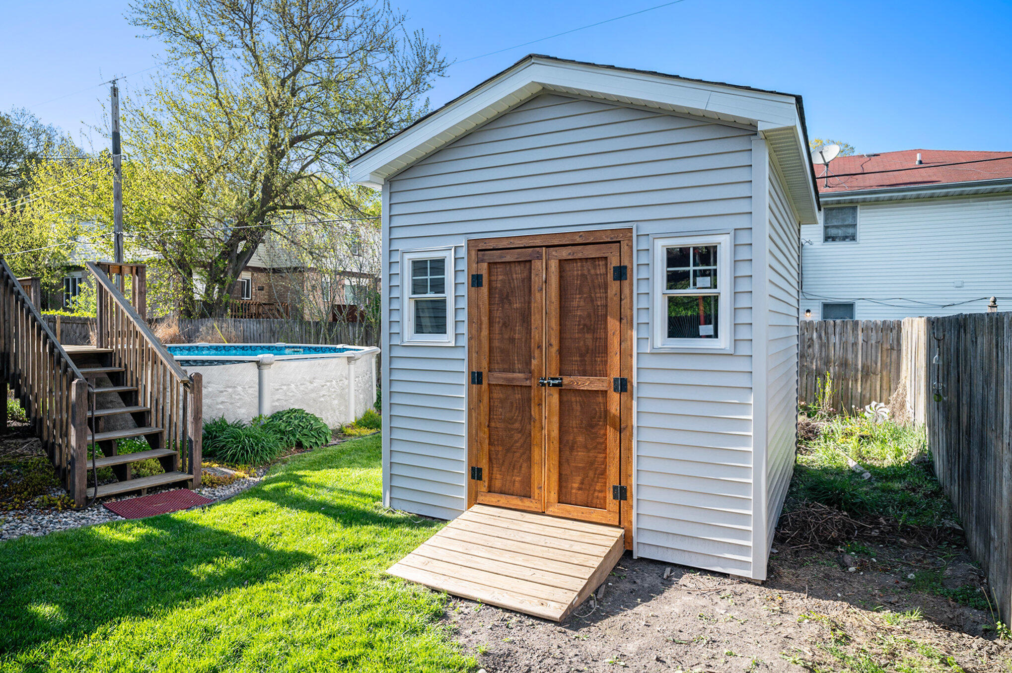 938 Walnut Lane Crown Point, IN 46307 - Photo 15 of 17 a front view of a house with garden