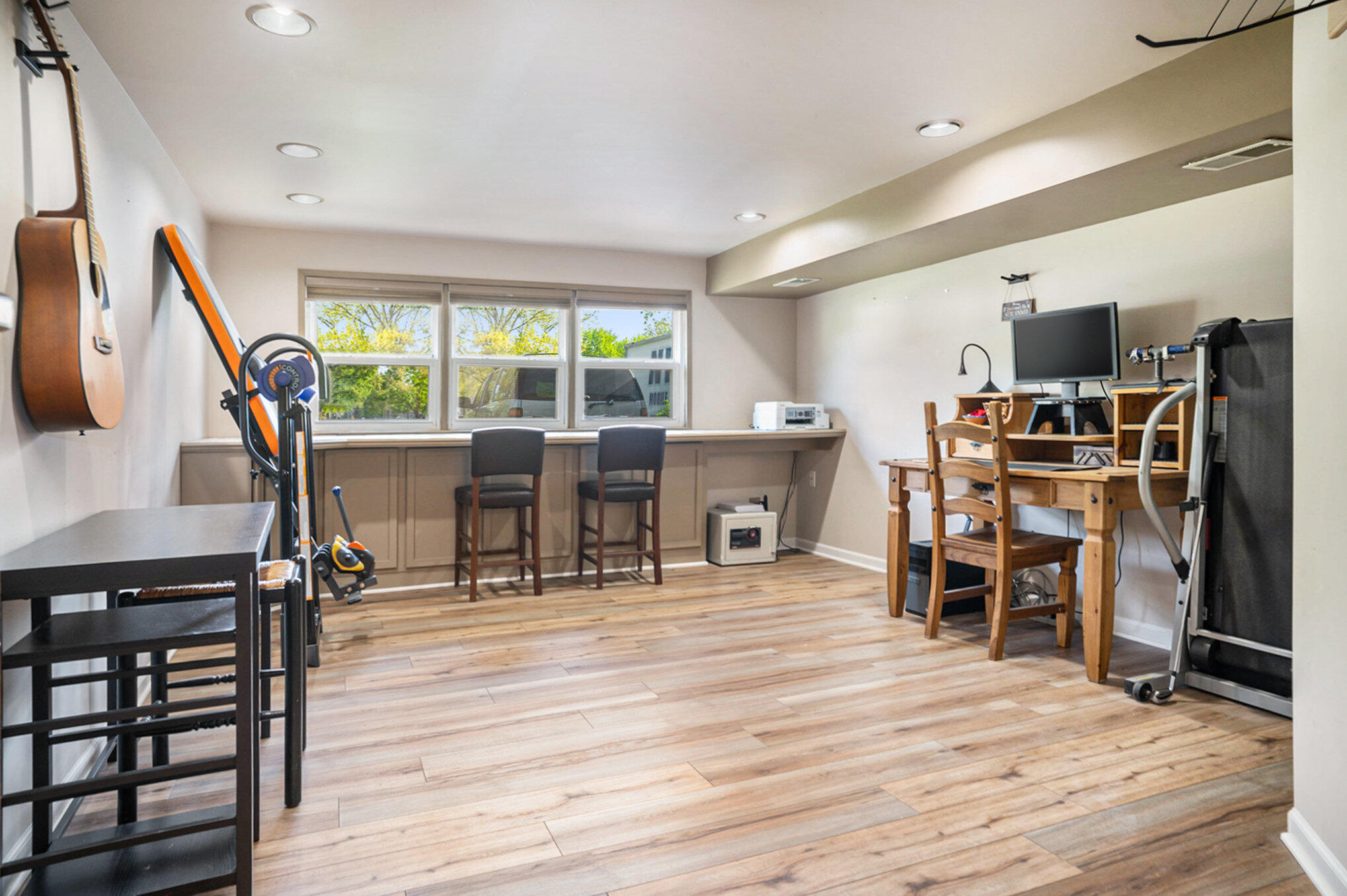 938 Walnut Lane Crown Point, IN 46307 - Photo 5 of 17 a view of a dining room with furniture and wooden floor