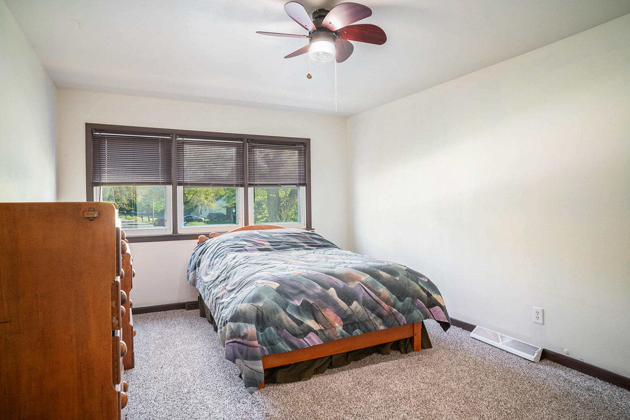 938 Walnut Lane Crown Point, IN 46307 - Photo 9 of 17 a bedroom with a bed and window