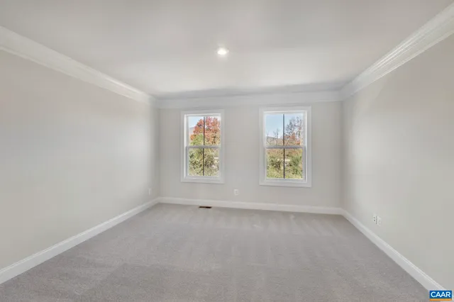 a bathroom with a double vanity sink toilet and shower