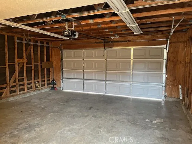 a view of a pathway both side of house