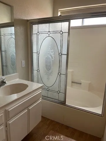 a view of an empty room with storage