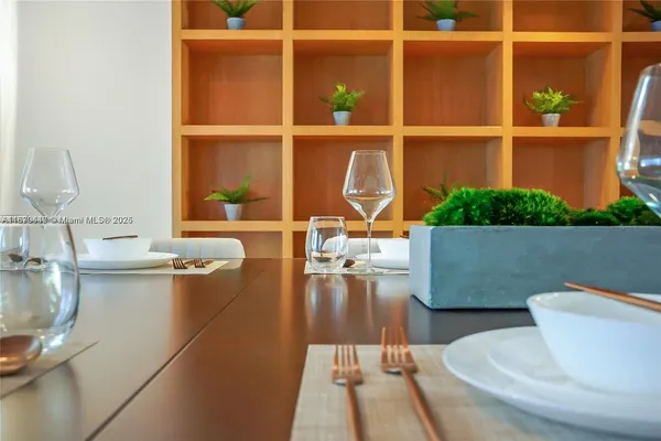 a dining room with wooden floor