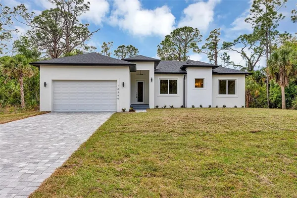 a view of outdoor space yard and garage