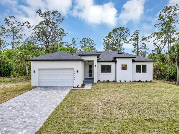 a house view with a garden space