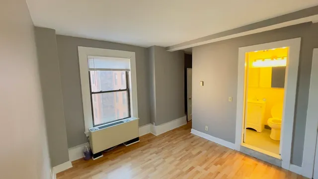 a bathroom with a sink toilet and bathtub