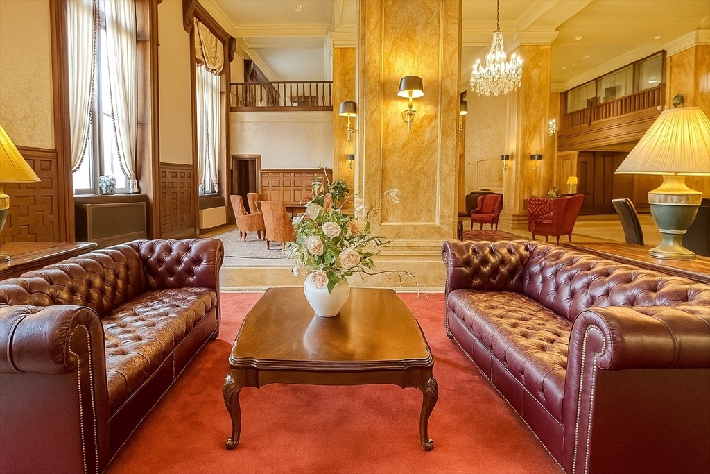 140 Chestnut Street, Unit 709 Springfield, MA 01103 - Photo 4 of 20 a living room with furniture and a large window
