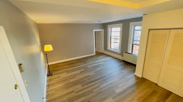 a view of a bathroom from a hallway