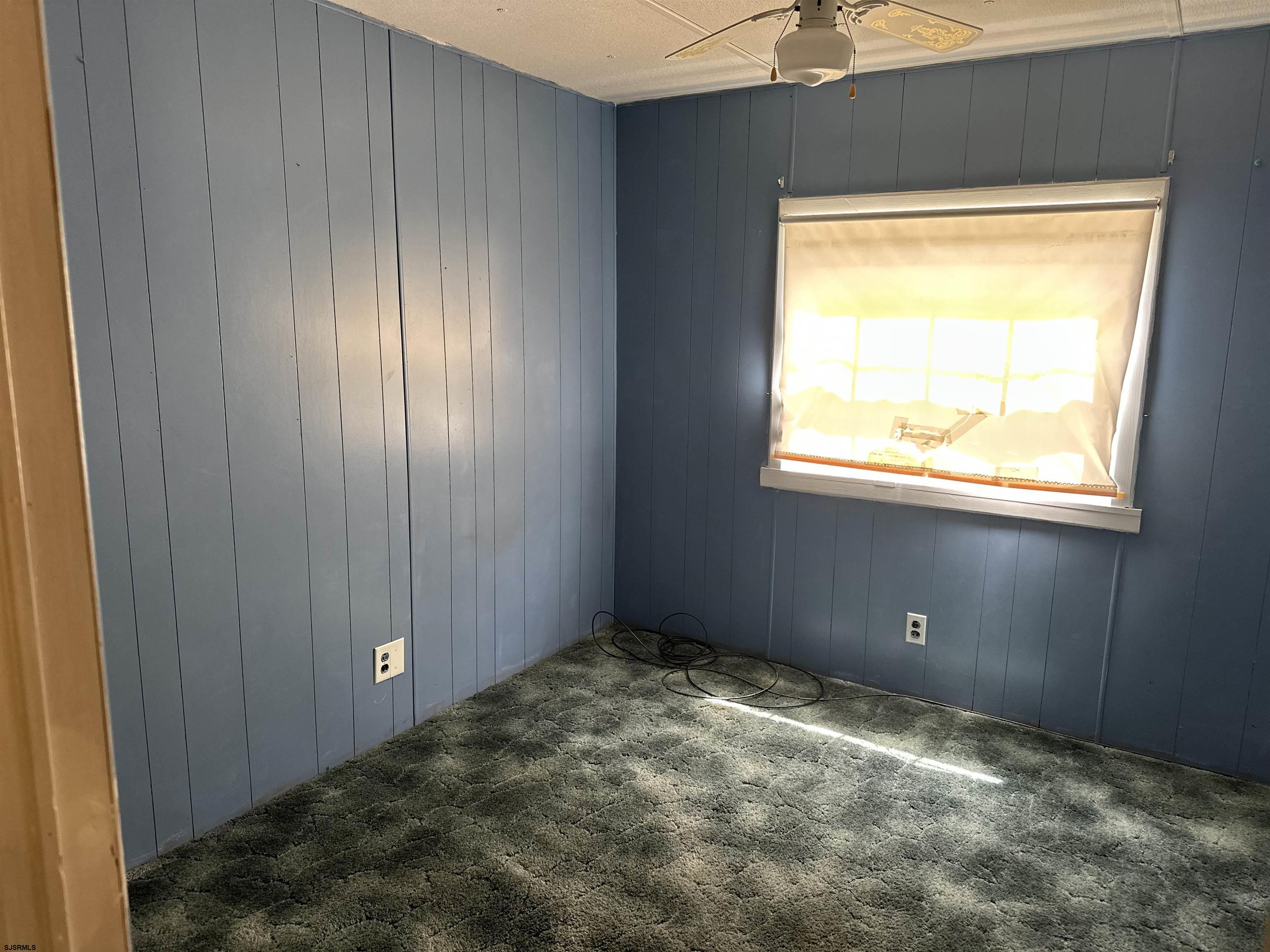 6215 Delilah Road Egg Harbor Township, NJ 08234 - Photo 13 of 18 a view of an empty room with a window