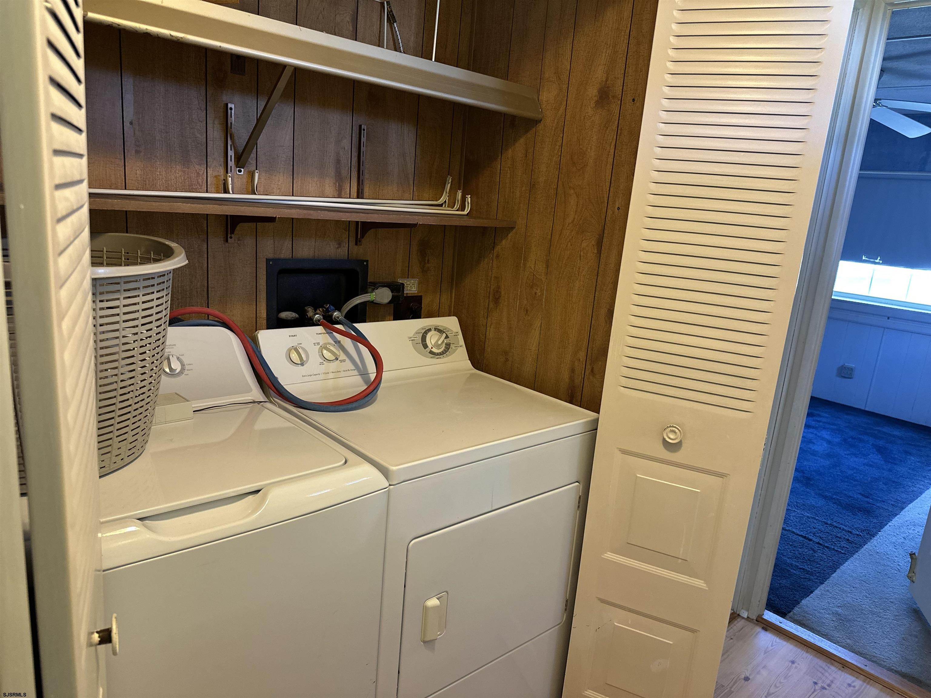 6215 Delilah Road Egg Harbor Township, NJ 08234 - Photo 14 of 18 a utility room with dryer and washer