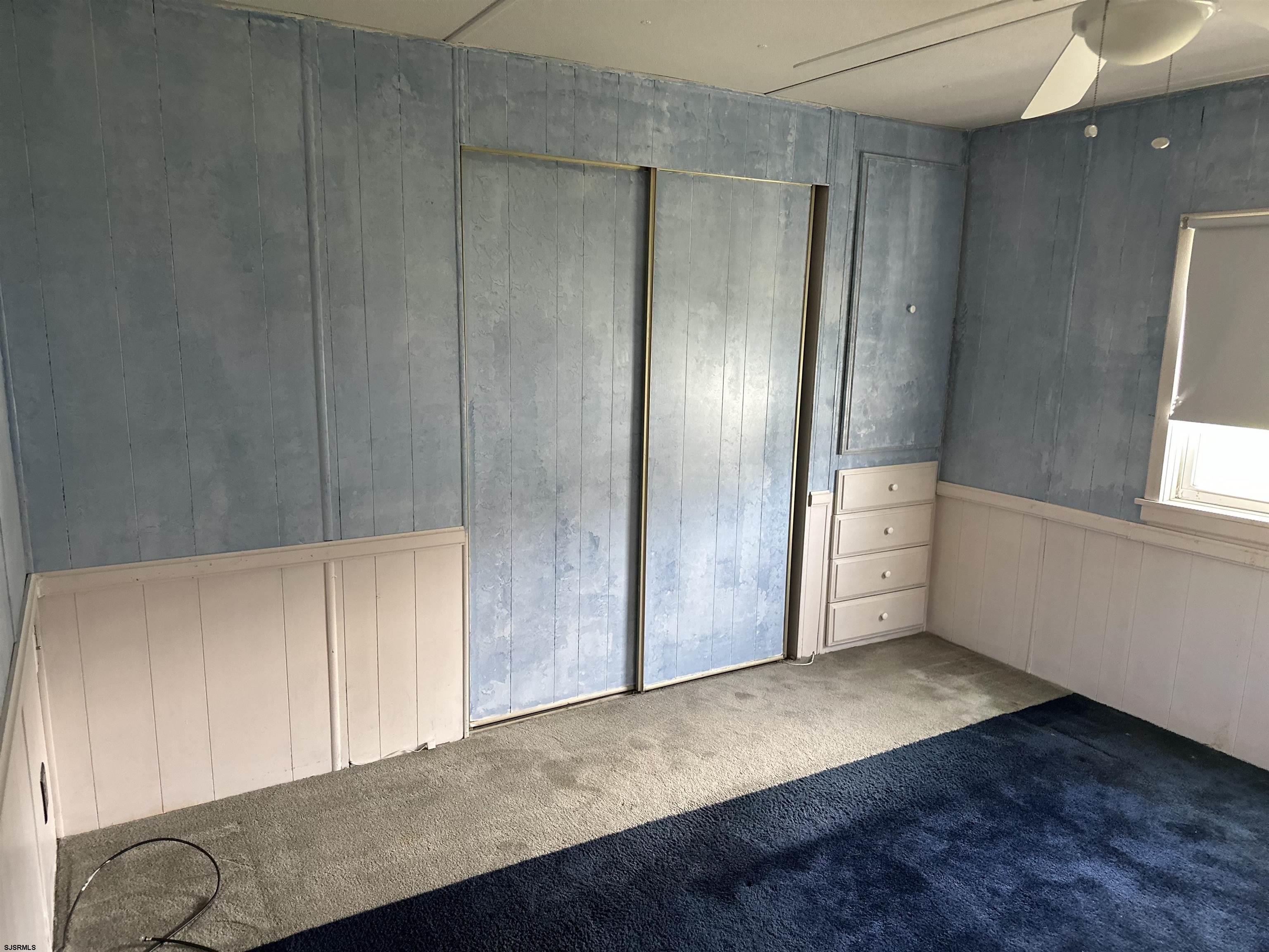 6215 Delilah Road Egg Harbor Township, NJ 08234 - Photo 9 of 18 an empty room with wooden floor