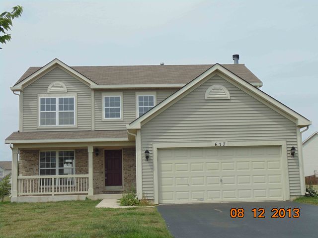 637 Deames Street Plano, IL 60545 - Photo 1 of 18 a view of front of a house with a yard