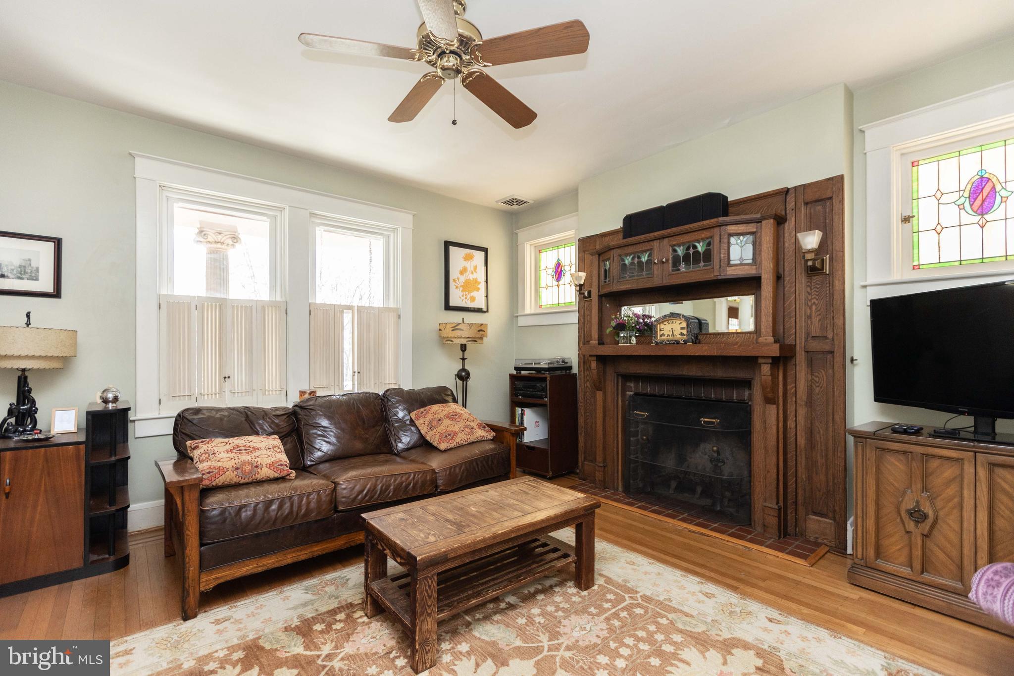 3304 Beverly Road Baltimore, MD 21214 - Photo 4 of 37 LR with wood burning FP & beautiful surround