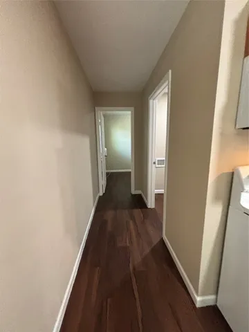 a bathroom with a bathtub and a toilet