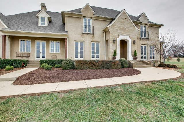 4131 Trinity Road Franklin, TN 37067 - Photo 3 of 18 a front view of a house with a yard
