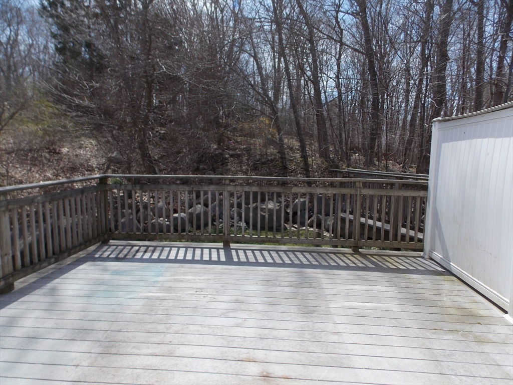 196 Main Street, Unit A Rockport, MA 01966 - Photo 29 of 36 a view of a balcony with wooden floor