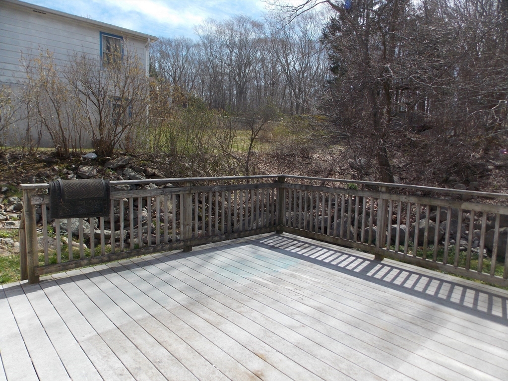 196 Main Street, Unit A Rockport, MA 01966 - Photo 32 of 36 a view of a balcony with wooden floor