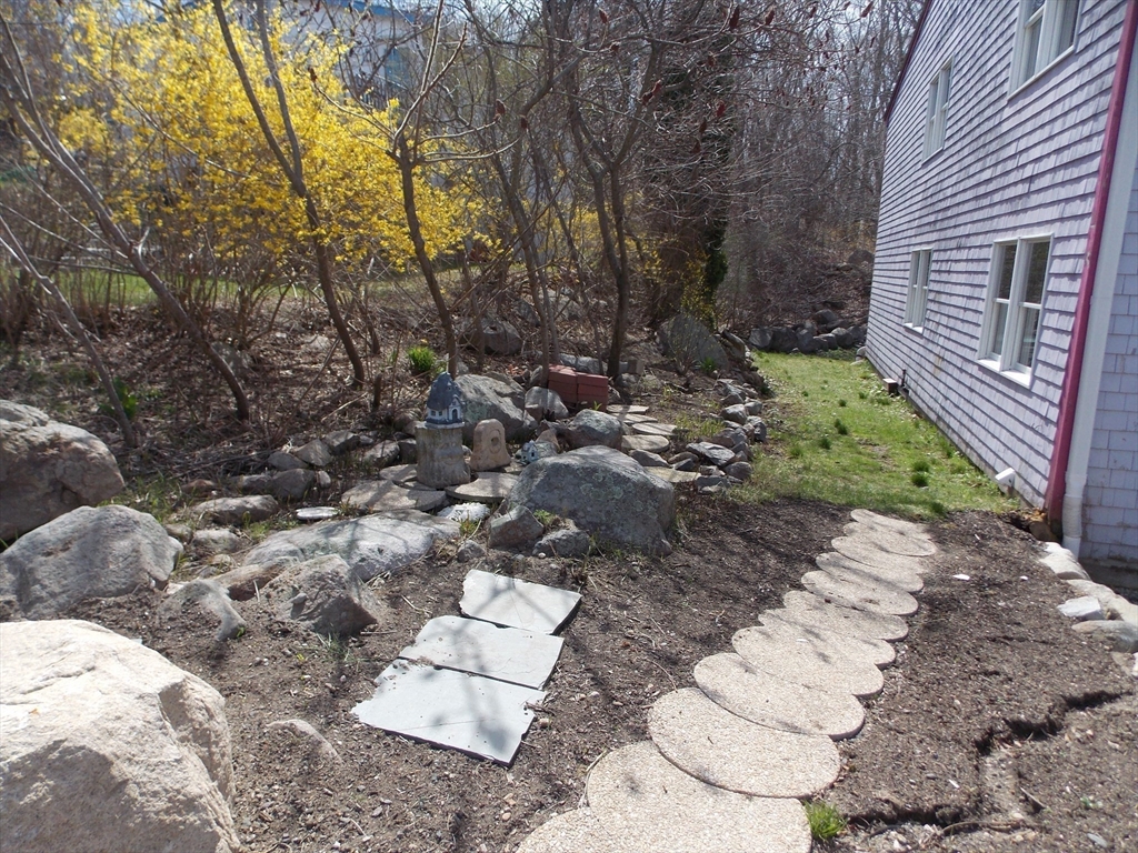 196 Main Street, Unit A Rockport, MA 01966 - Photo 34 of 36 a view of backyard with green space