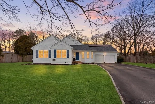 a front view of a house with yard